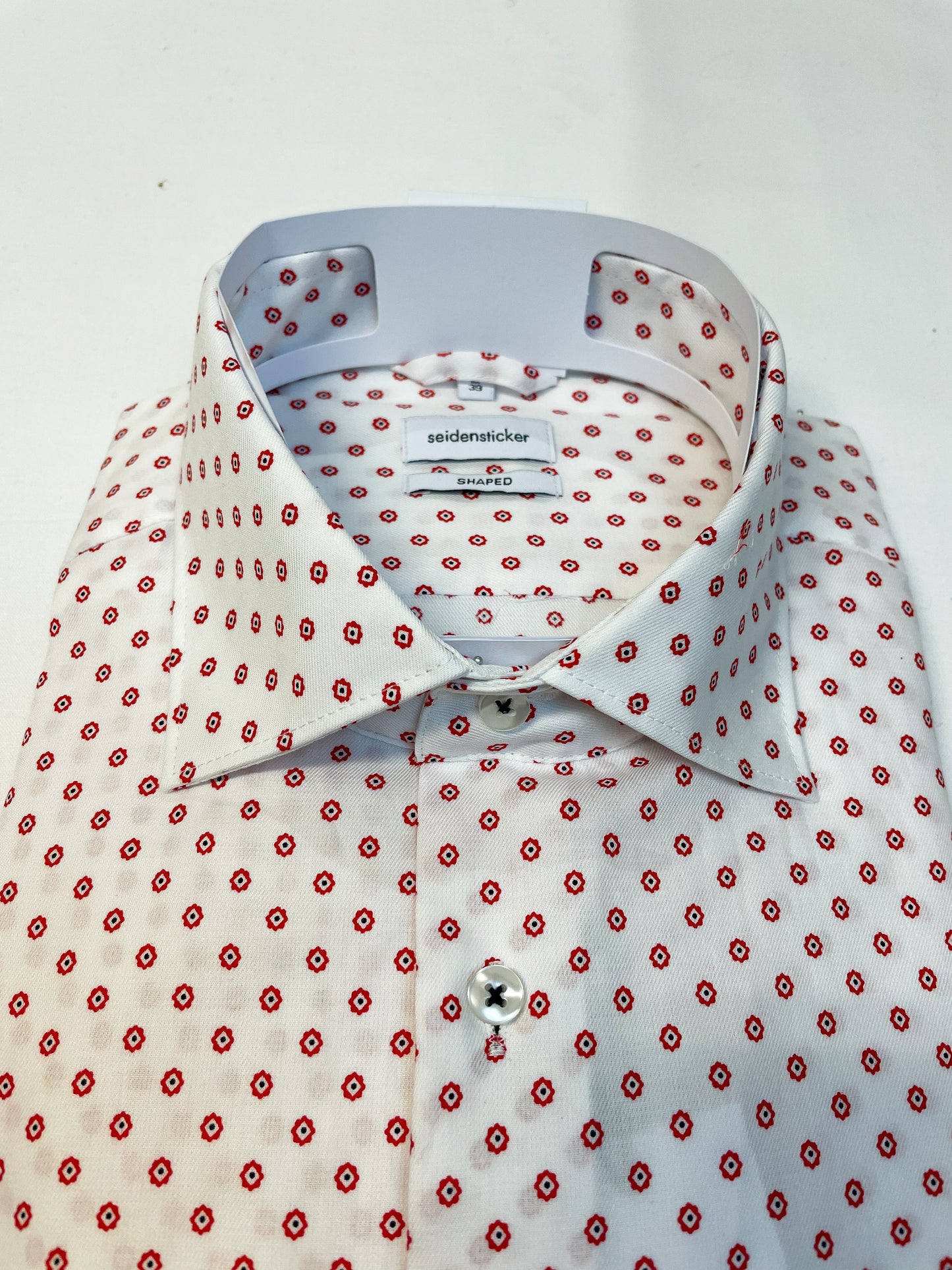 White Shirt with Red Spot
