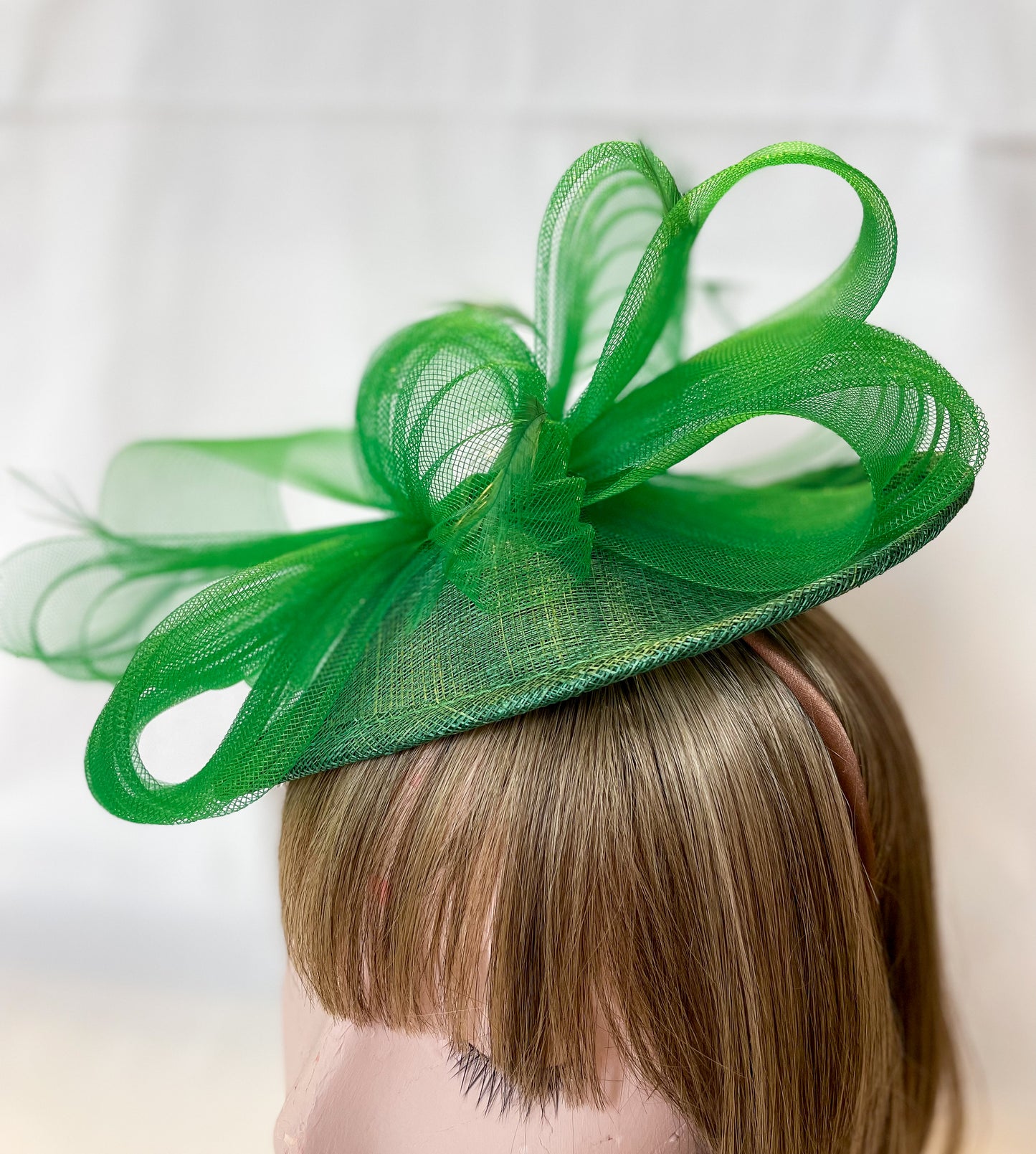 Green fascinator