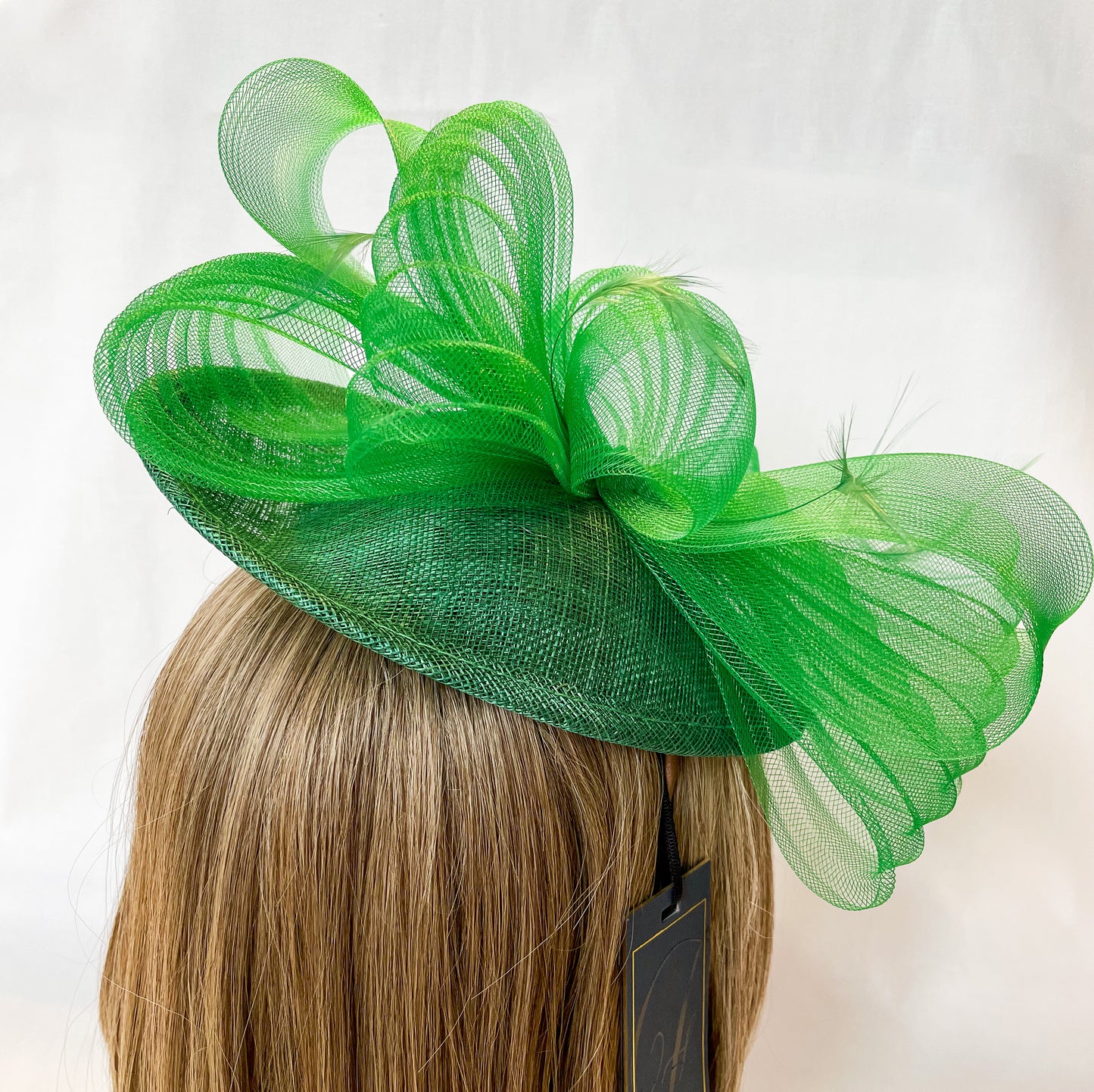 Green fascinator