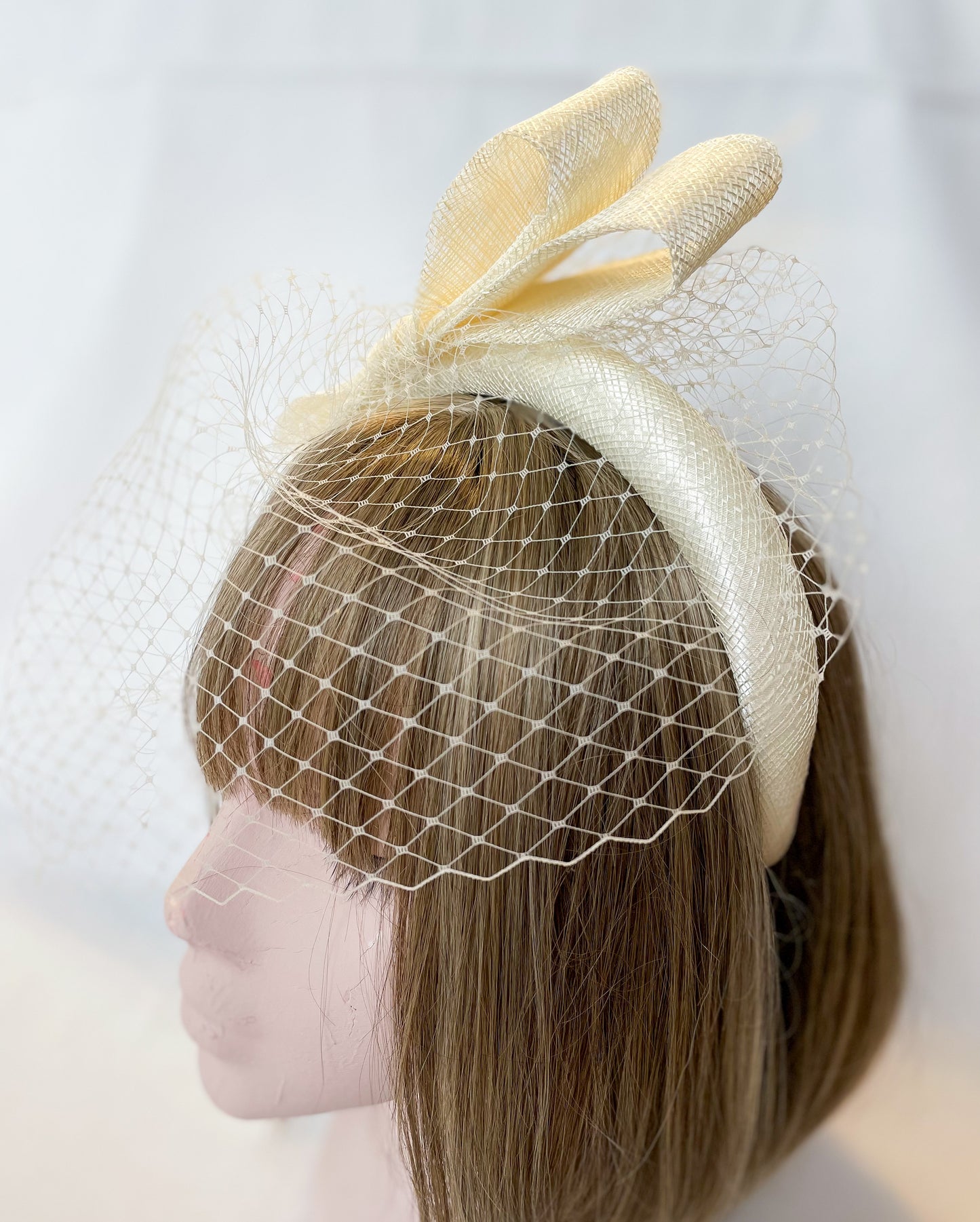 Ivory veiled fascinator