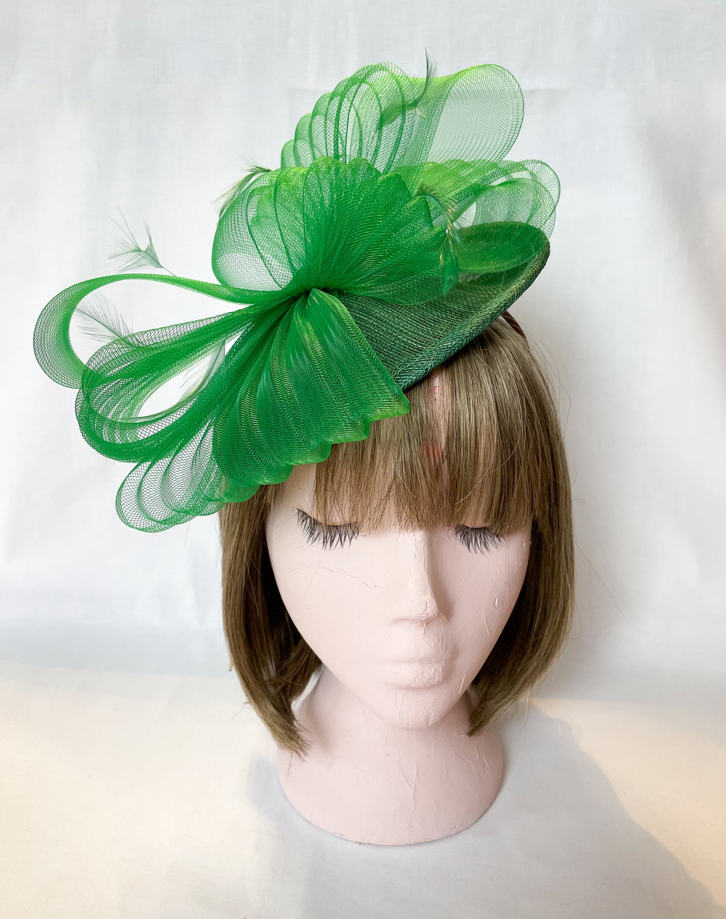 Green fascinator