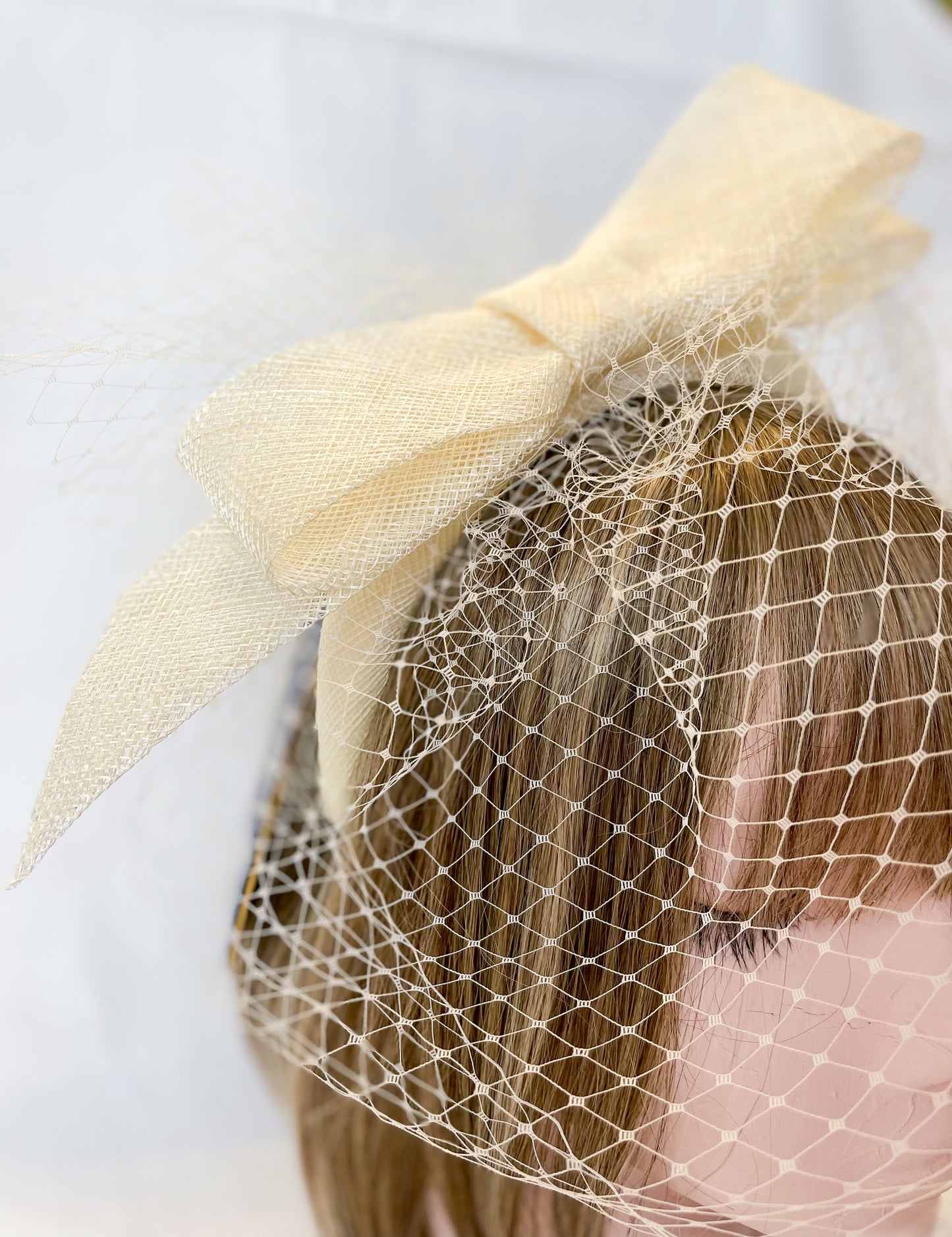 Ivory veiled fascinator